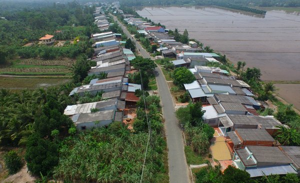 Người dân vùng rốn lũ Bình Tân nay định cư ổn định trên các khu dân cư vượt lũ.