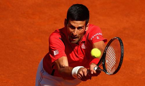 Djokovic thắng trận đầu tiên từ sau khi bị loại ở Monte Carlo. Ảnh: Reuters.