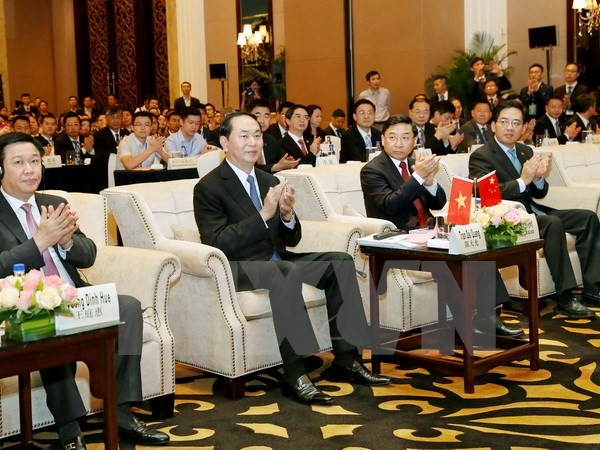 Chủ tịch nước Trần Đại Quang (giữa). (Ảnh: Nhan Sáng/TTXVN)
