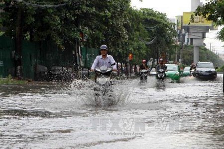 Cần đề phòng ngập úng tại các đô thị, thành phố lớn do mưa bão. Ảnh: Thanh Tùng/TTXVN