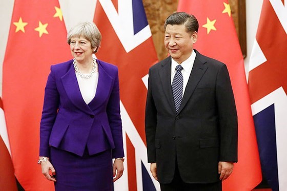 Thủ tướng Anh Theresa May và Chủ tịch Trung Quốc Tập Cận Bình. Ảnh REUTERS.
