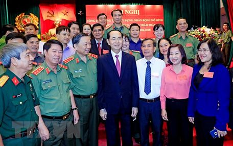 Chủ tịch nước Trần Đại Quang với các đại biểu. (Ảnh: Nhan Sáng/TTXVN)