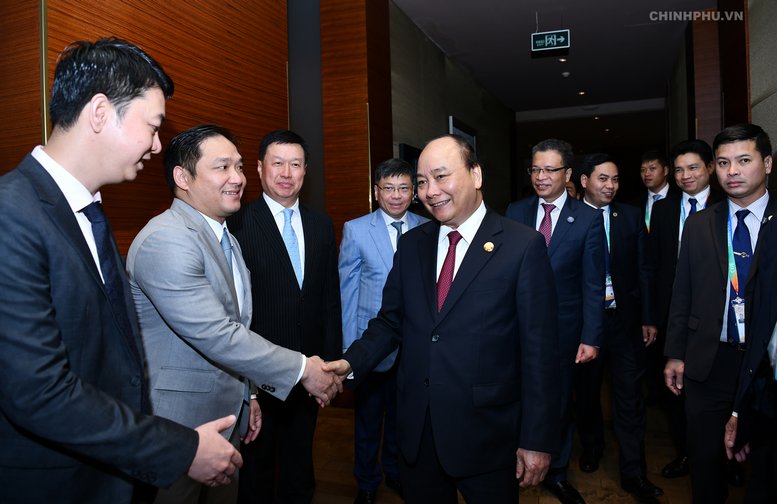 Chủ tịch Tập đoàn China Greenland Trương Ngọc Lương bày tỏ niềm vui khi được gặp Thủ tướng tại Thượng Hải. Ảnh: VGP/Quang Hiếu