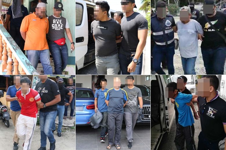 Nhóm đặc nhiệm chống khủng bố Malaysia bắt giữ những kẻ tình nghi (ảnh: Straittimes)