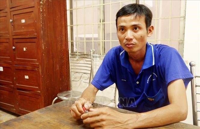 Đối tượng Nguyễn Minh Tâm tại cơ quan điều tra.