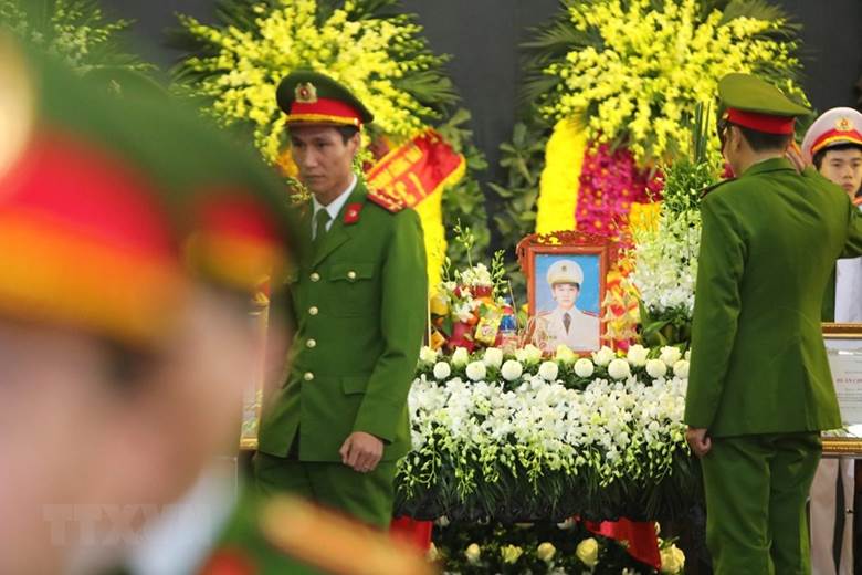  Những hình ảnh xúc động tại Lễ tang 3 chiến sỹ Công an nhân dân hy sinh tại Đồng Tâm. (Ảnh: Thành Đạt/TTXVN)